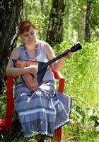 Medium-tempo Russian/Slavic style dance with a Balalaika solo.